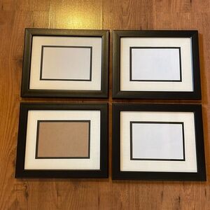 Set of 4 picture frames with mats.